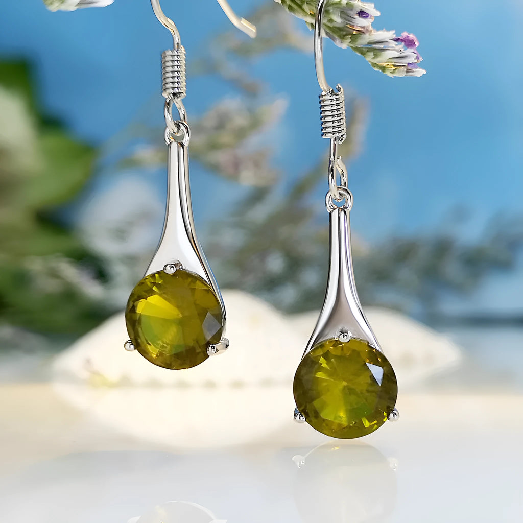 Olive green topaz water drop shaped earrings with electroplated finish and retro styling