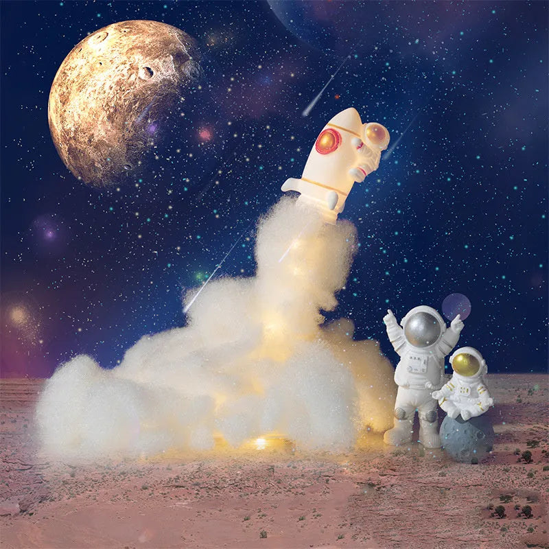 DIY astronaut rocket night light kit parts including plastic rocket, LED string, straws, and 19cm base