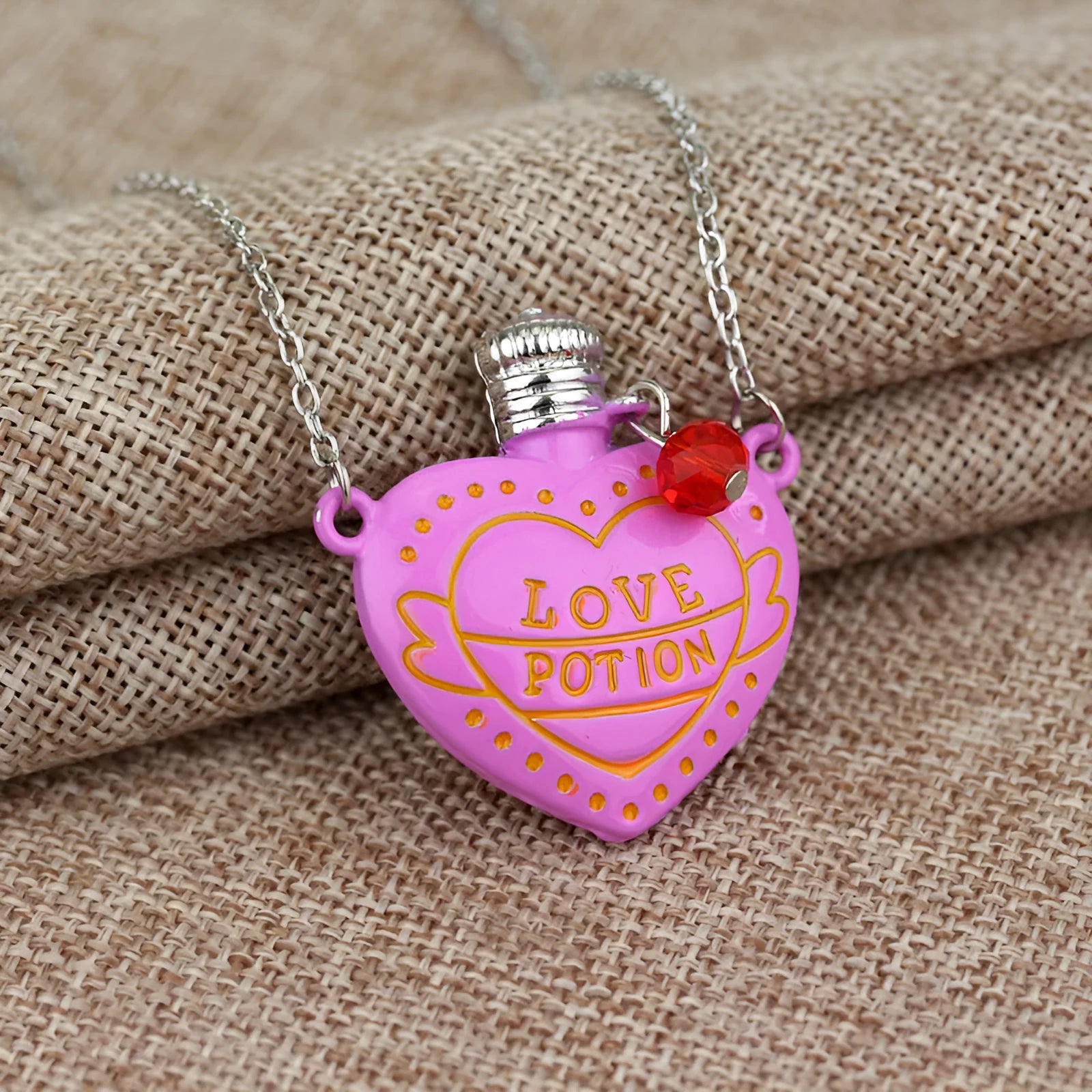 Love poison pill bottle pendant necklace in rose red on a box chain