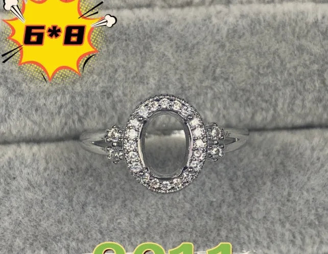 Korean style open mouth copper ring with 6x8mm oval denier stone and star decorations.