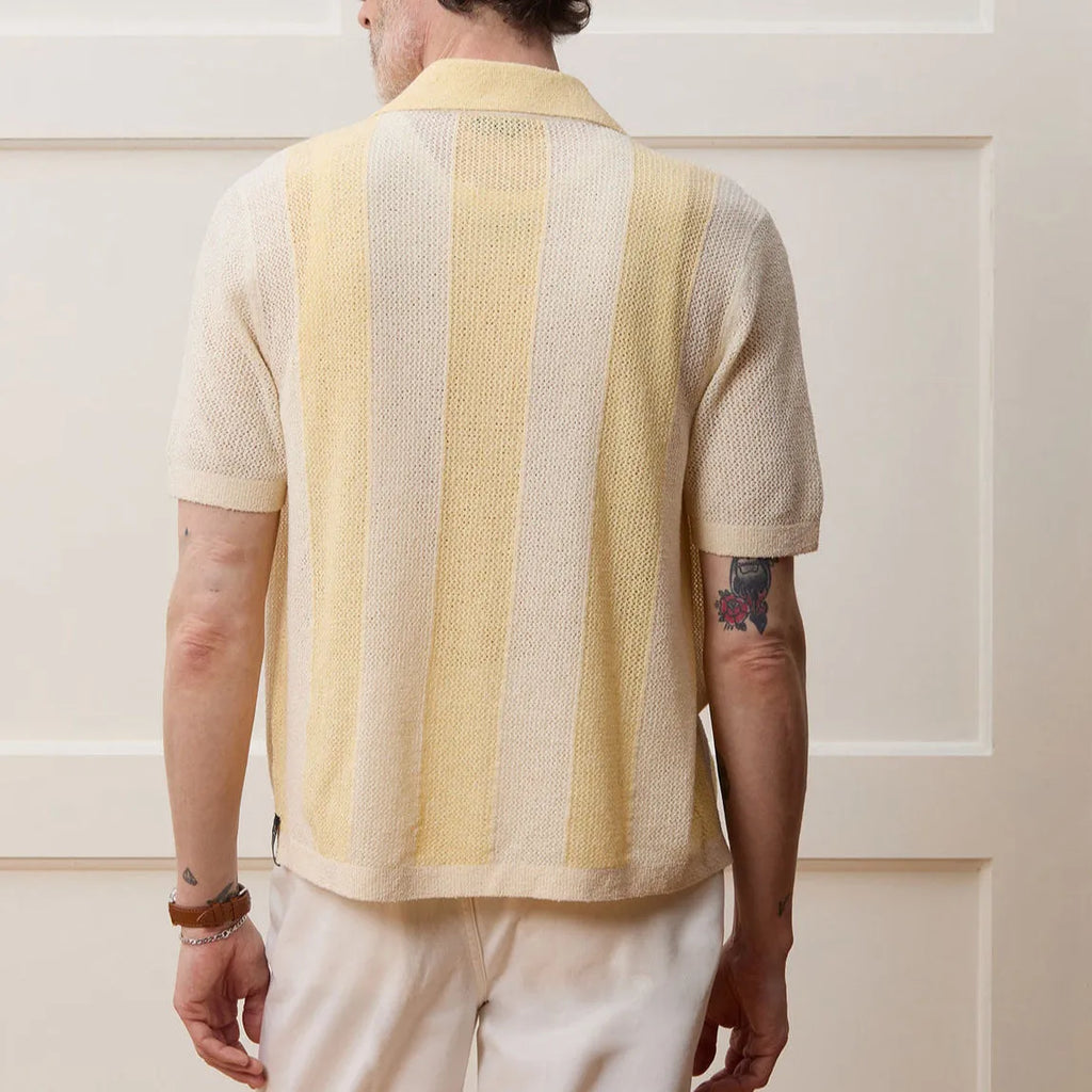 Yellow women's hollow-out polo shirt with asymmetric design and short sleeves