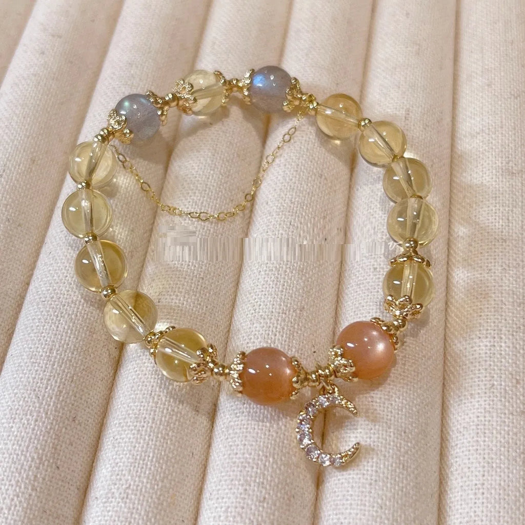 Chinese style women's crystal bracelet with a citrine moonstone and 14K gold electroplating.