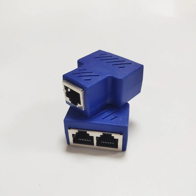 Two white RJ45 network cable splitter adapters showing three ports each.