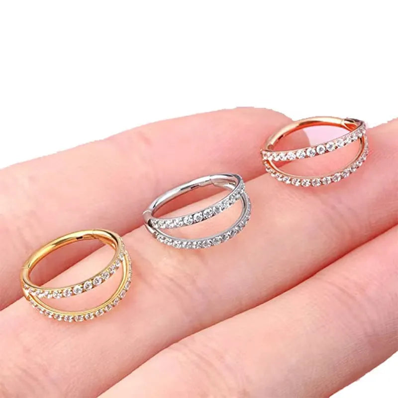 G23 titanium alloy body jewellery ring in gold or steel colour with diamond treatment, showing hoop design.
