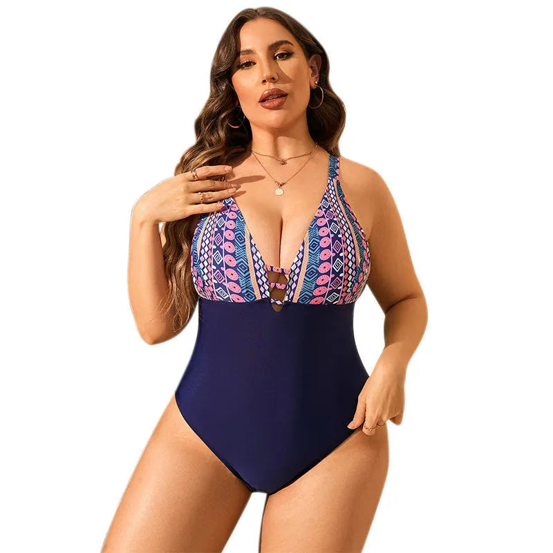 Plus size female one-piece swimsuit with V-neck, leopard print, and conservative tummy coverage.