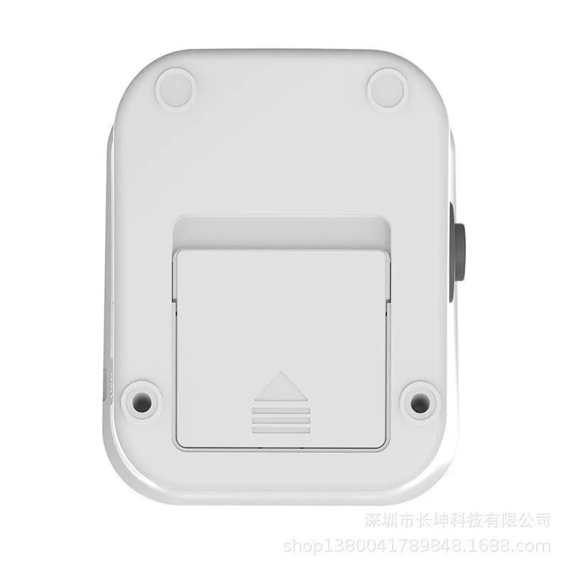 White electronic blood pressure monitor with large screen showing blood pressure and pulse readings