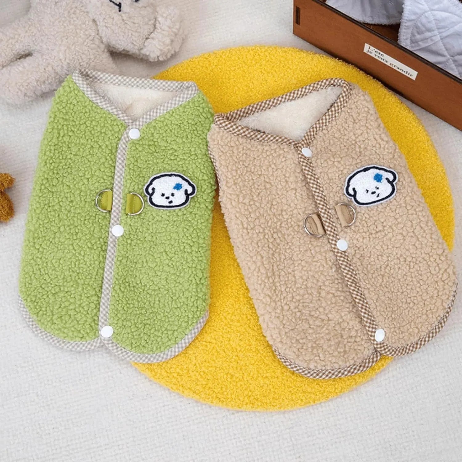 Green coral fleece dog vest with a metal leash ring on the back for a small dog