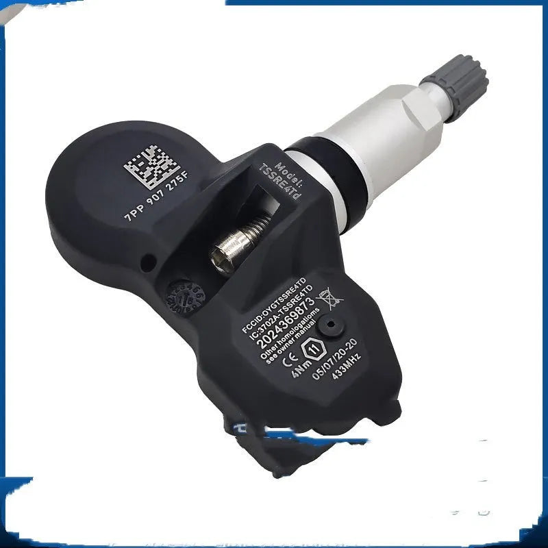 Black Audi tyre pressure monitor sensor for TPMS replacement with wireless transmission