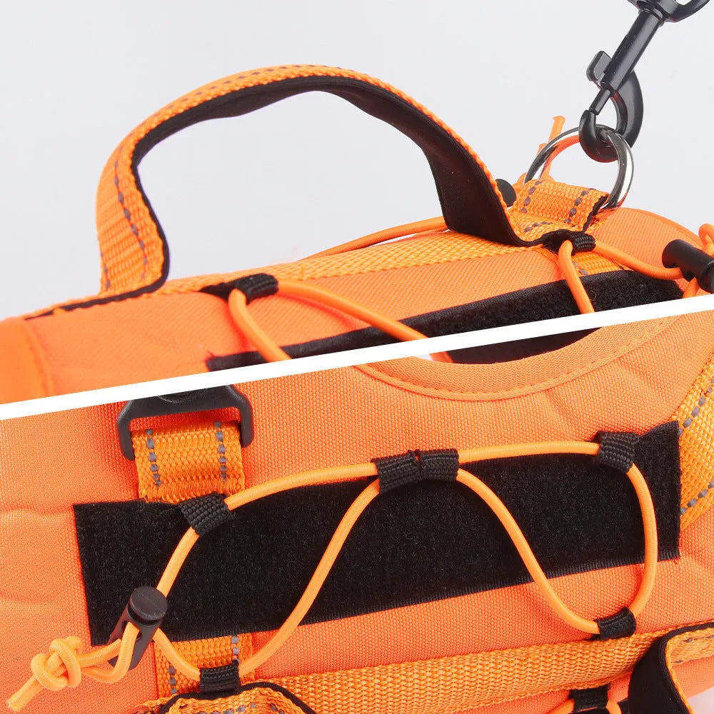 Orange dog harness vest with reflective trim and an attached black hand-holding rope leash.
