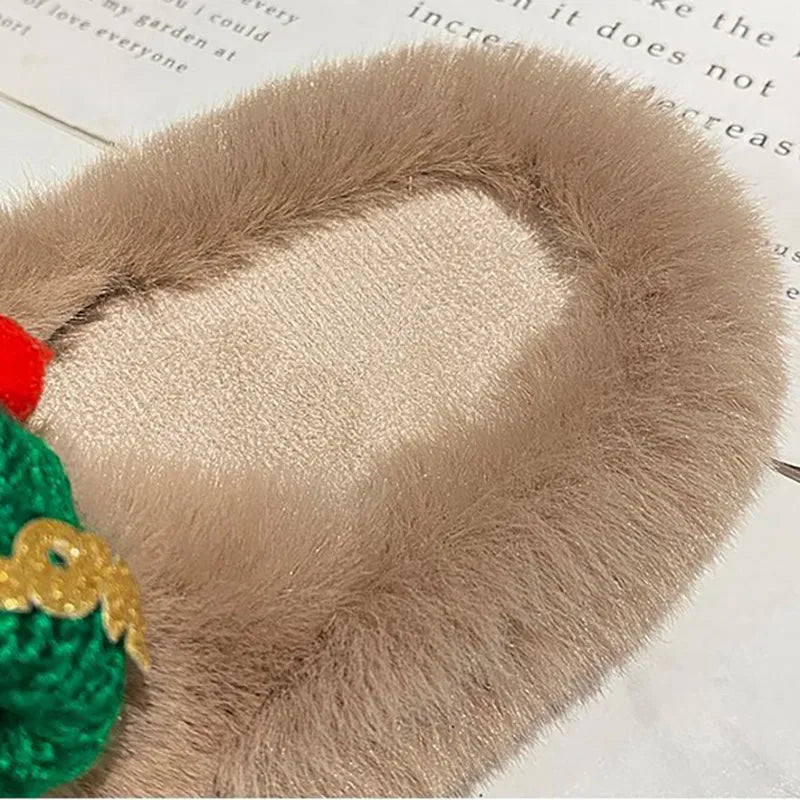Women's Christmas slippers with red Santa hat decoration on a super hairy faux plush upper.