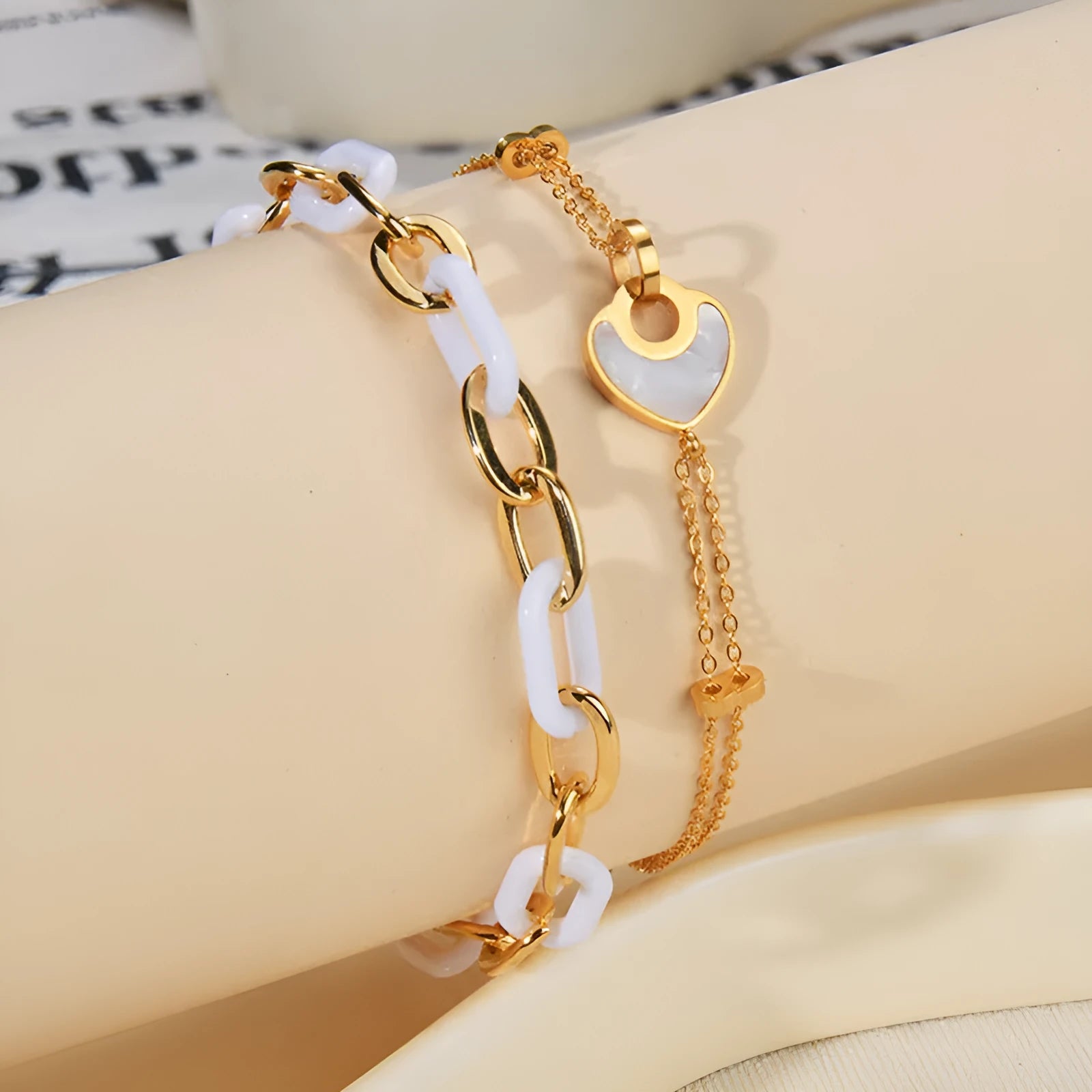 Stainless steel and resin heart-shaped bracelet for women with double layer design.