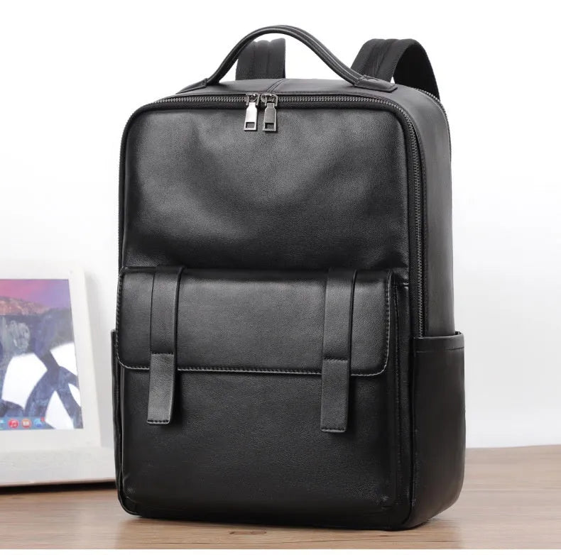 Men's black genuine leather computer backpack with 36-55L capacity for business travel
