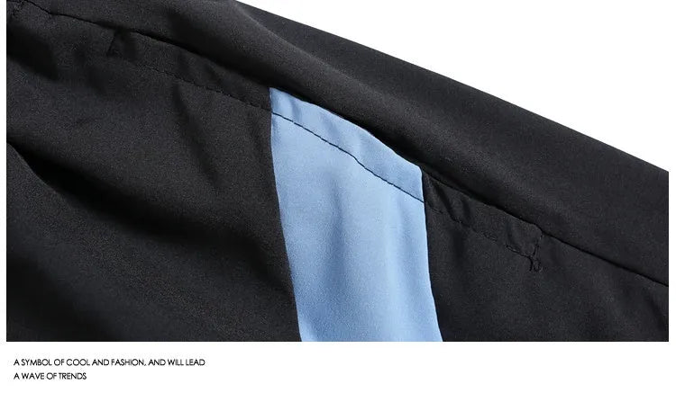 Men's quick-drying black sports shorts with elastic waistband and loose straight-leg fit
