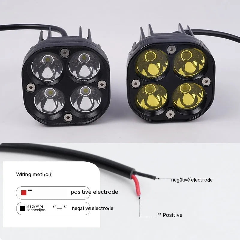 Four-leaf clover style motorcycle spotlight with aluminium base plate.