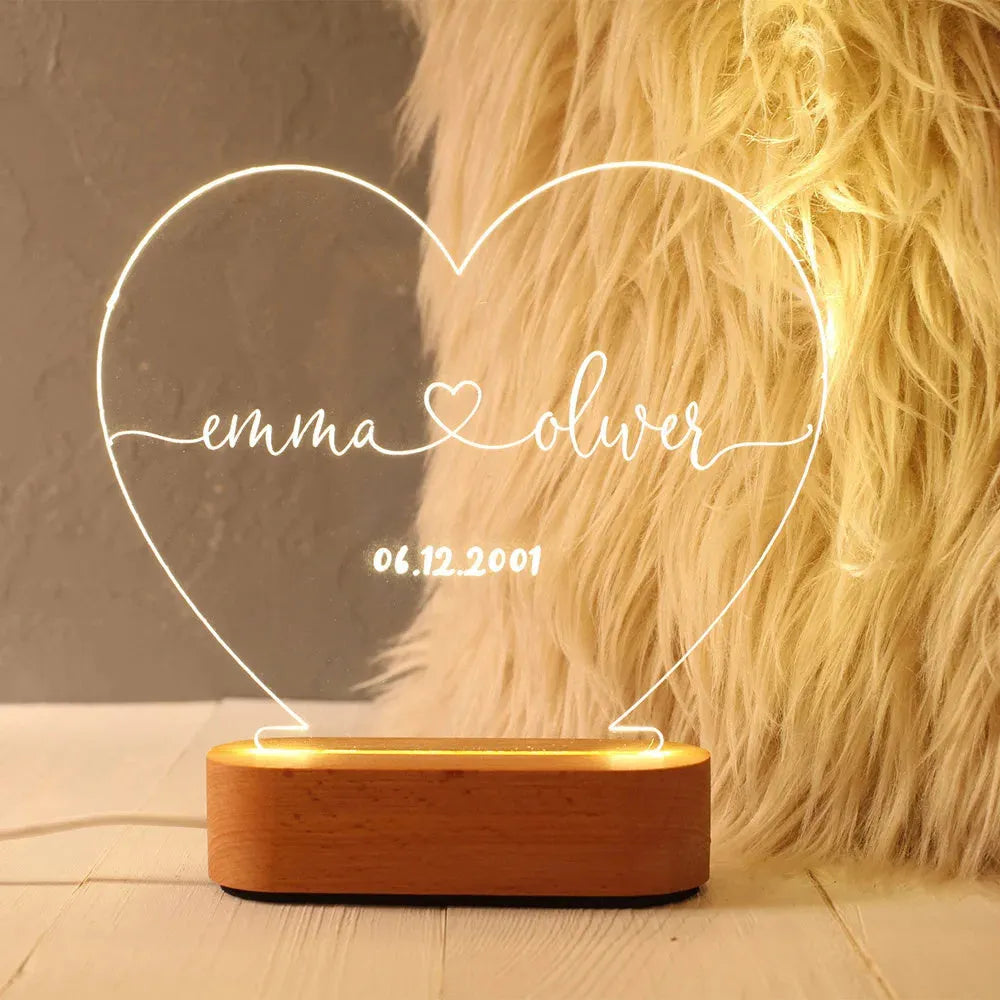 Custom acrylic LED night light displaying personalised names and date text