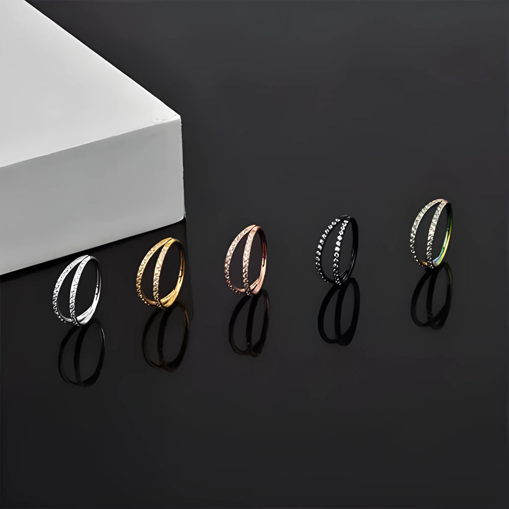 G23 titanium alloy body jewellery ring in gold or steel colour with diamond treatment, showing hoop design.