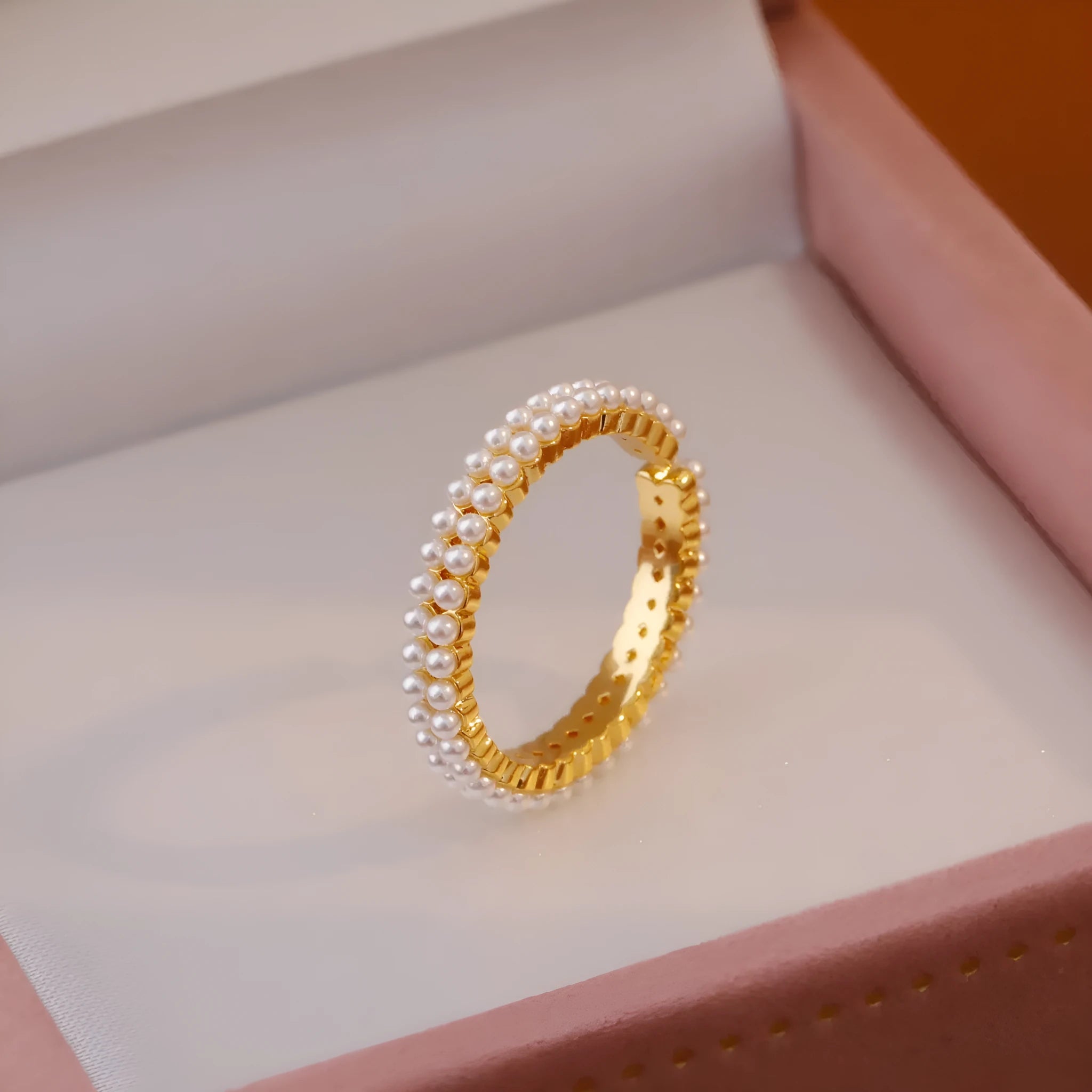 Gold geometric open mouth women's ring with pearl detailing on copper base