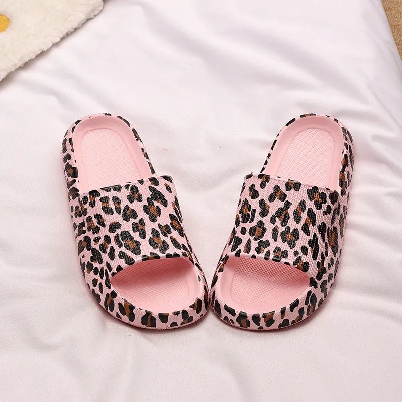 Women's leopard print EVA slippers with a thick sole, shown in multiple colour options.