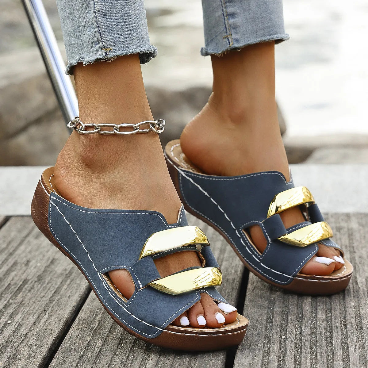 Roman style platform flip-flops in black, white, khaki and sea blue colours showing artificial PU upper and rubber sole