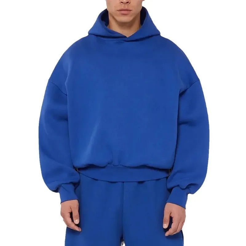 Men's solid colour fleece-lined cotton hoodie with a wool lining, shown in a pullover sweatshirt style.