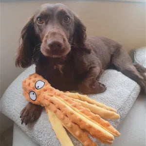Blue octopus-shaped dog toy with crinkle sound features measuring 32cm long