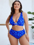 Blue floral print women's two-piece bikini swimsuit on a hanger.