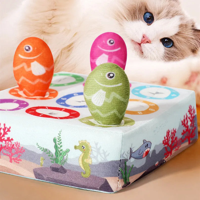Sky blue plush simulated fish cat toy with realistic animal pattern on a neutral background.