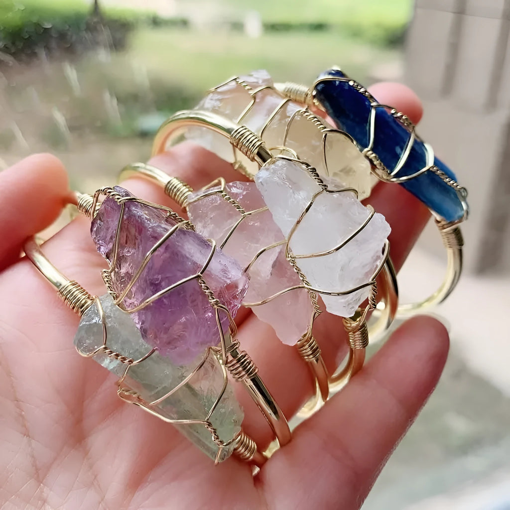Natural crystal rough stone bracelet with gold metal winding in a geometric bohemian design
