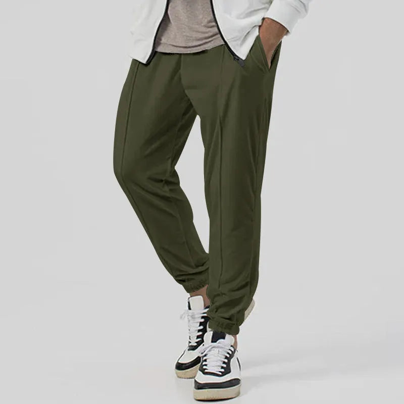 Men's casual track sweatpants in straight-leg tapered design with cotton blend fabric