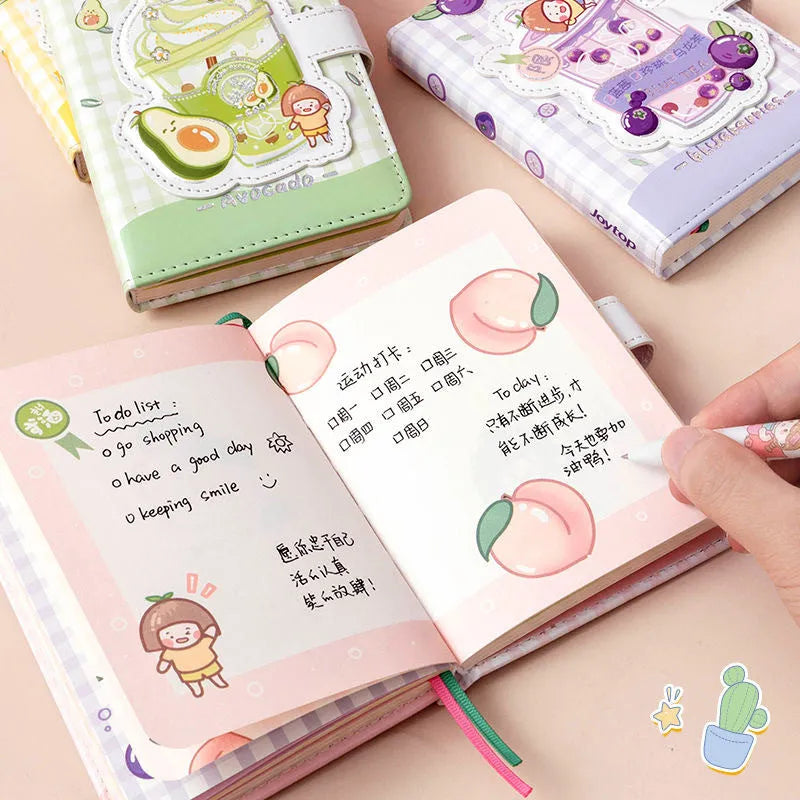 Cute magnetic buckle notebook with heart design in pink, yellow, green, and purple colours