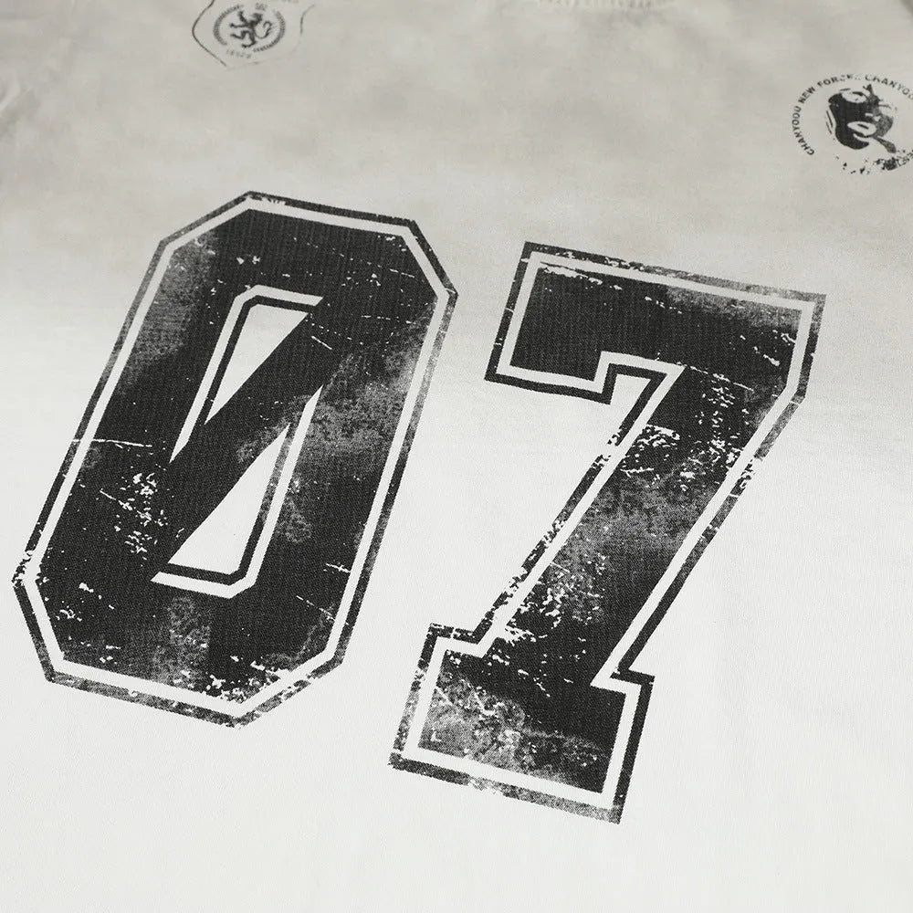 Men's black and white pure cotton short-sleeved printed t-shirt shown on size chart.