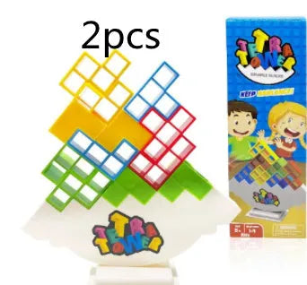 Plastic balance stacking game with coloured blocks on chassis for family play