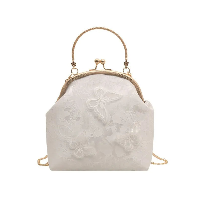Women's fabric embroidered chain retro messenger bag in bucket shape, soft material, single shoulder strap, colour black