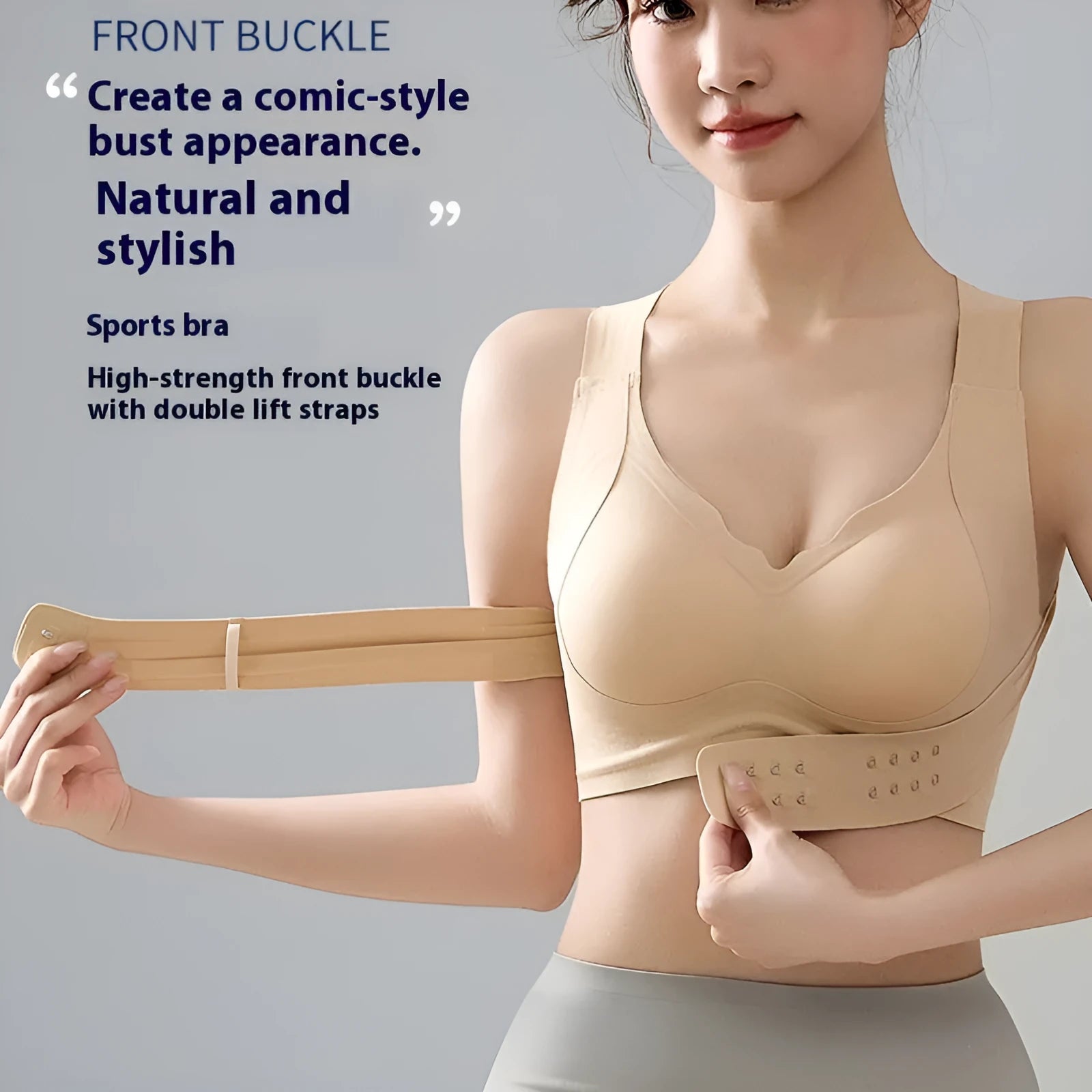 Women's black sports bra with front buckle closure and back shaping, shown on a size mannequin.