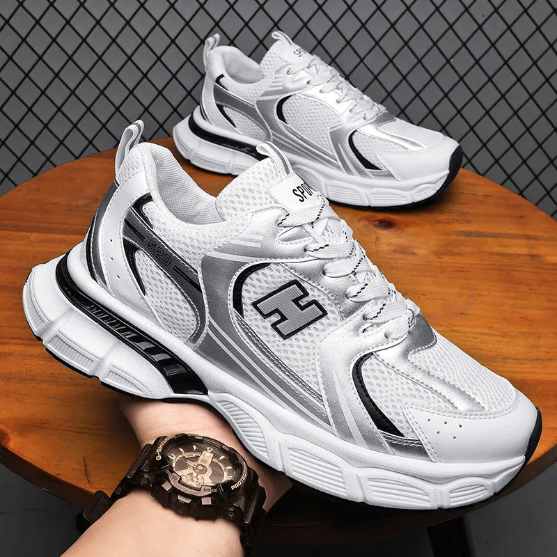 Men's mesh running shoes with plastic sole in black, white and grey, and white orange colour options