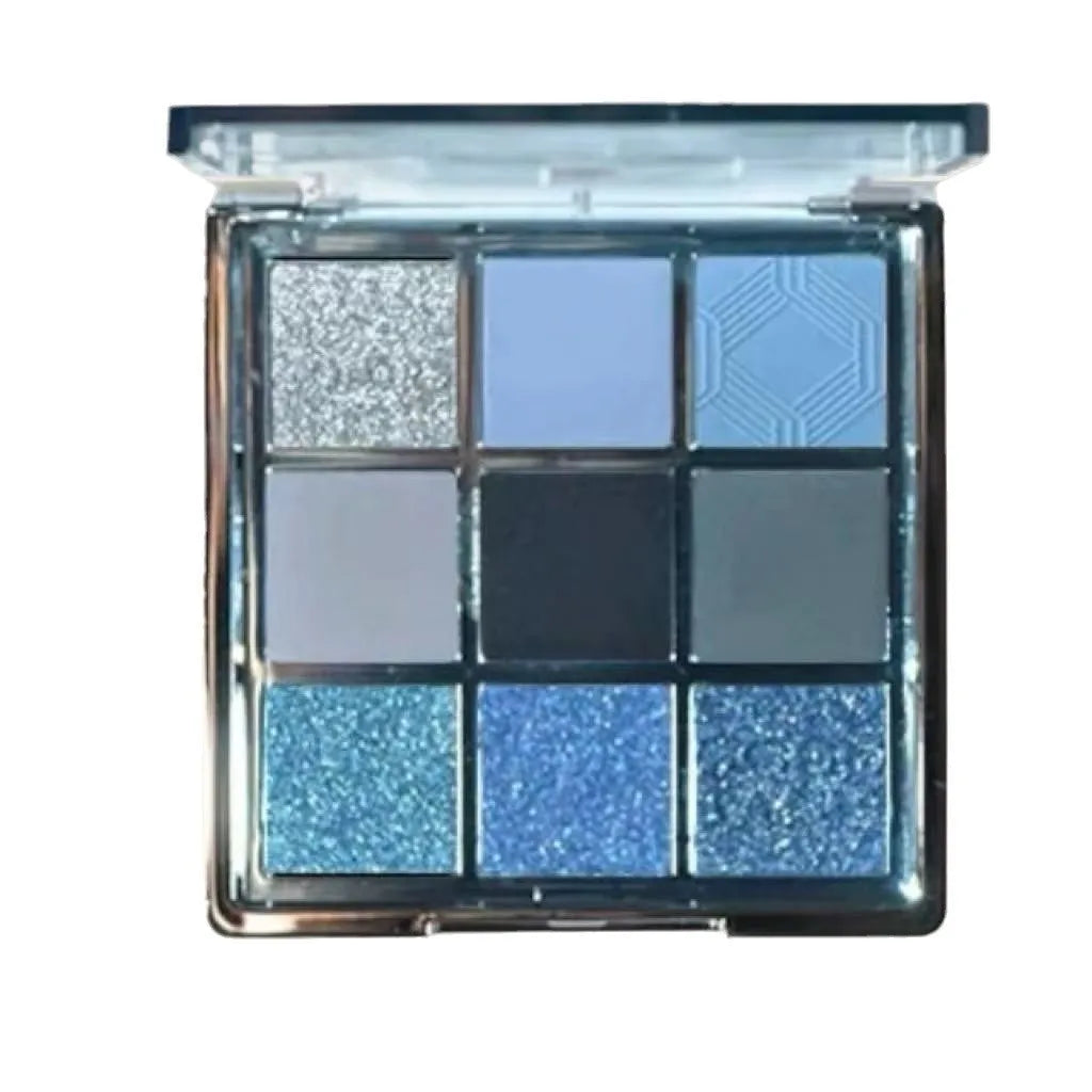 Nine-colour eye shadow palette with blue smoked shades showing matte and shimmer finishes