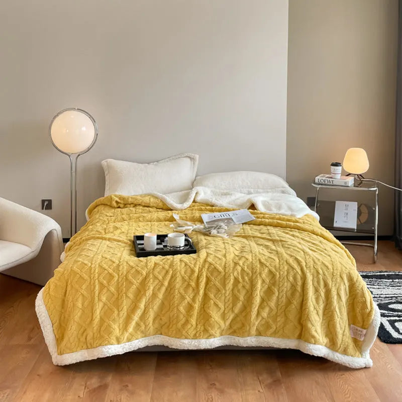 Polyester thermal flannel blanket in tea green colour on a bed, showing modern simplicity design.
