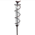 Cast iron stand with glass tube rain gauge featuring bird decoration and 1-20 measurement scale.