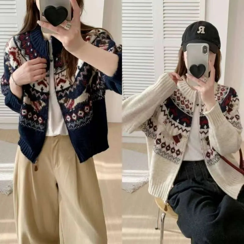 Ethnic style beige apricot jacquard pullover sweater with 3D pattern on a hanger.