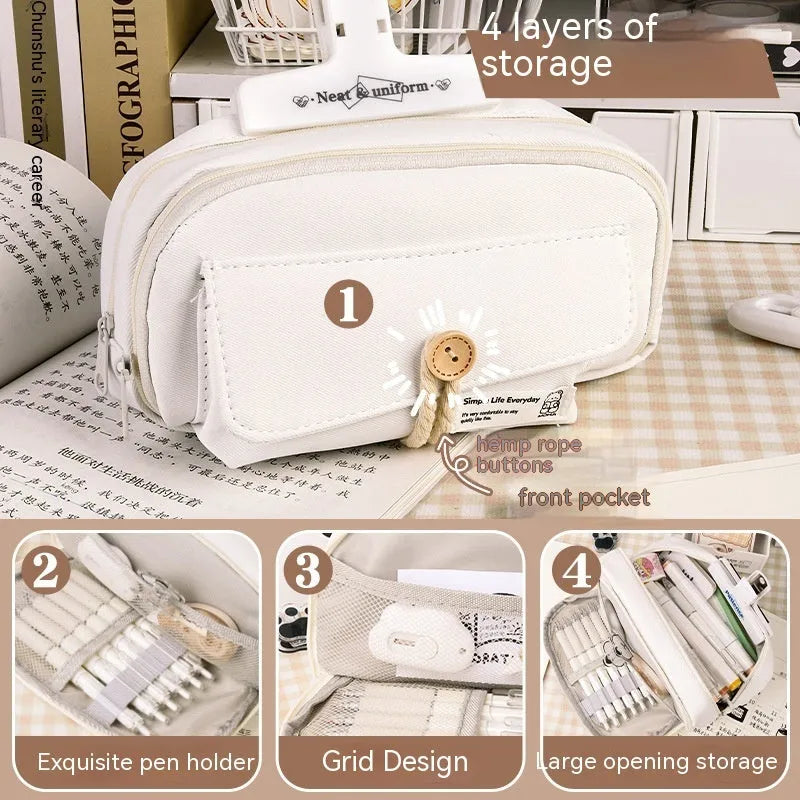 Korean style canvas pencil case in beige, blue, grey, or green holding multiple pens