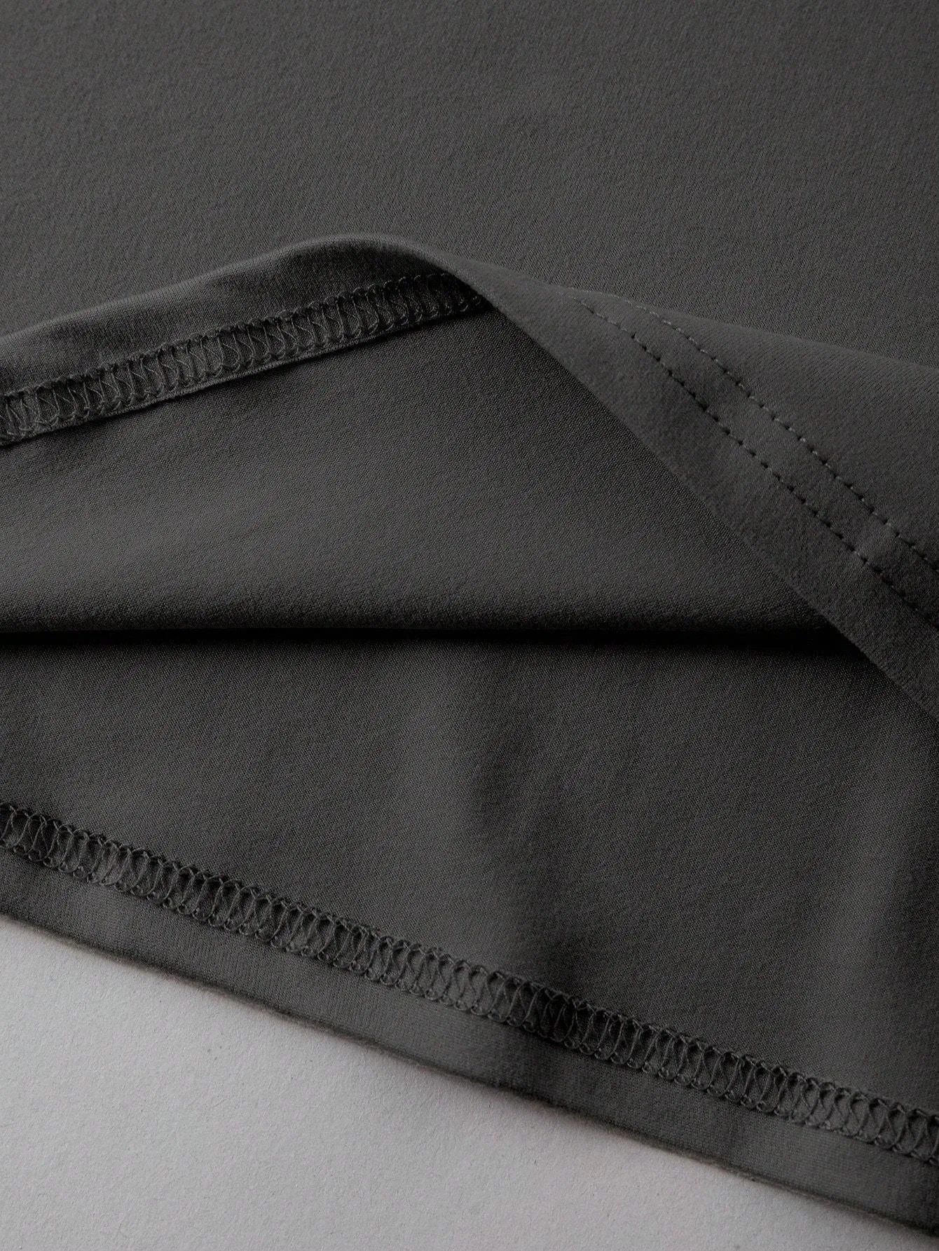 Loose-fit short-sleeve cotton T-shirt in various colours on a size chart background.