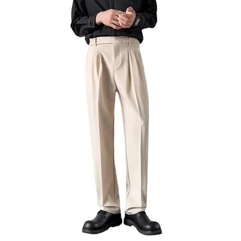 Man wearing straight loose fit suit trousers in apricot colour for formal or office setting