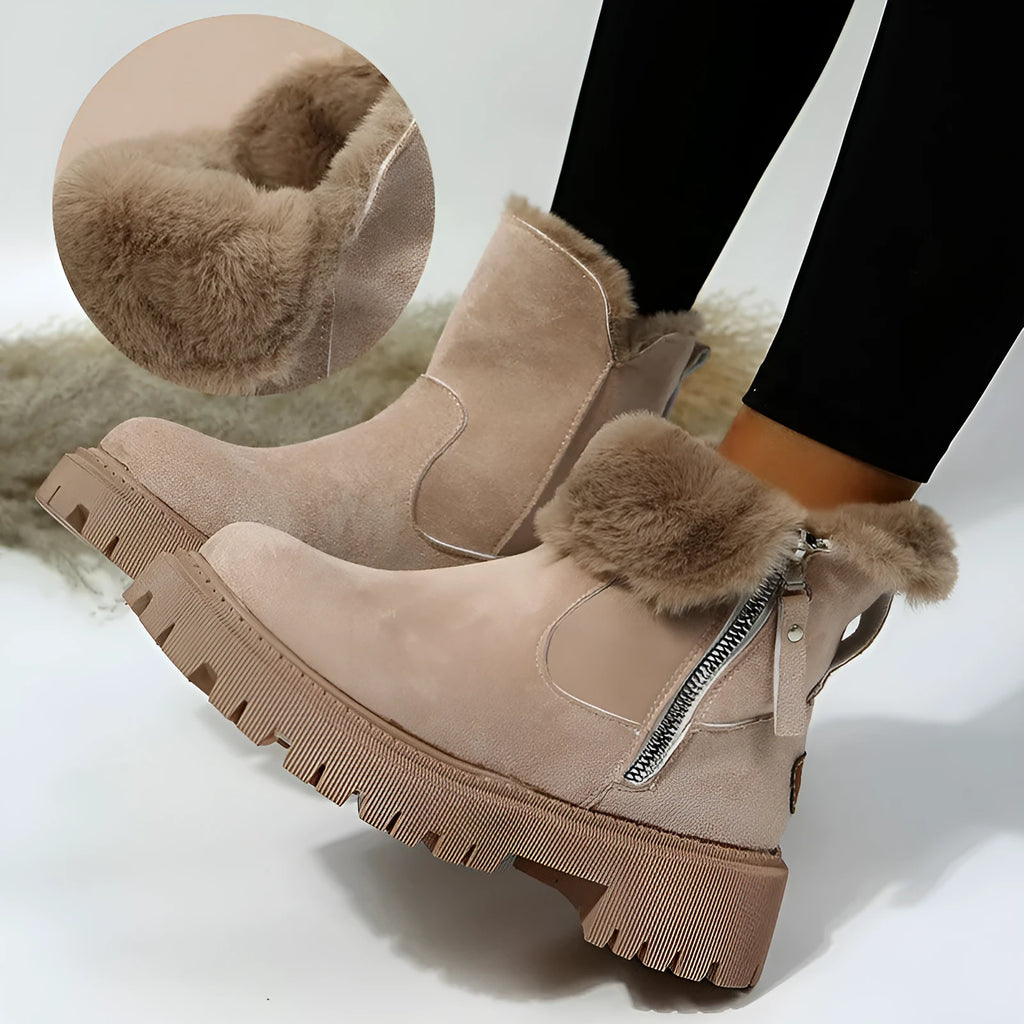 Women's black faux suede high-top snow boots with a side zipper and thick plush lining.