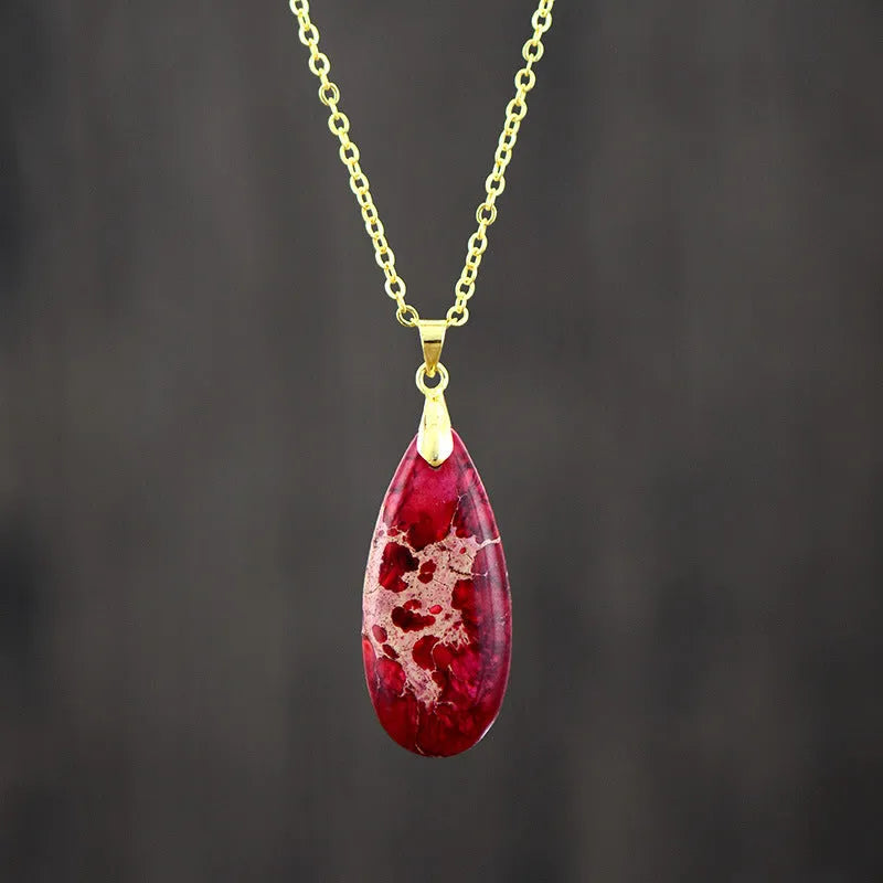 Jade pendant necklace with 18K gold plated chain showing water drop, heart, bow, and constellation designs