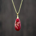 Jade pendant necklace with 18K gold plated chain showing water drop, heart, bow, and constellation designs