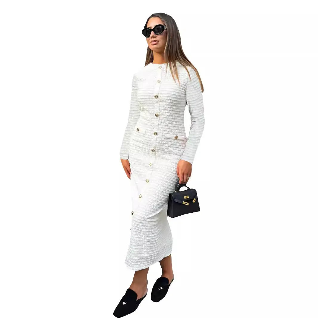 Black and white French retro slim fit knitted long-sleeved dress with button details.