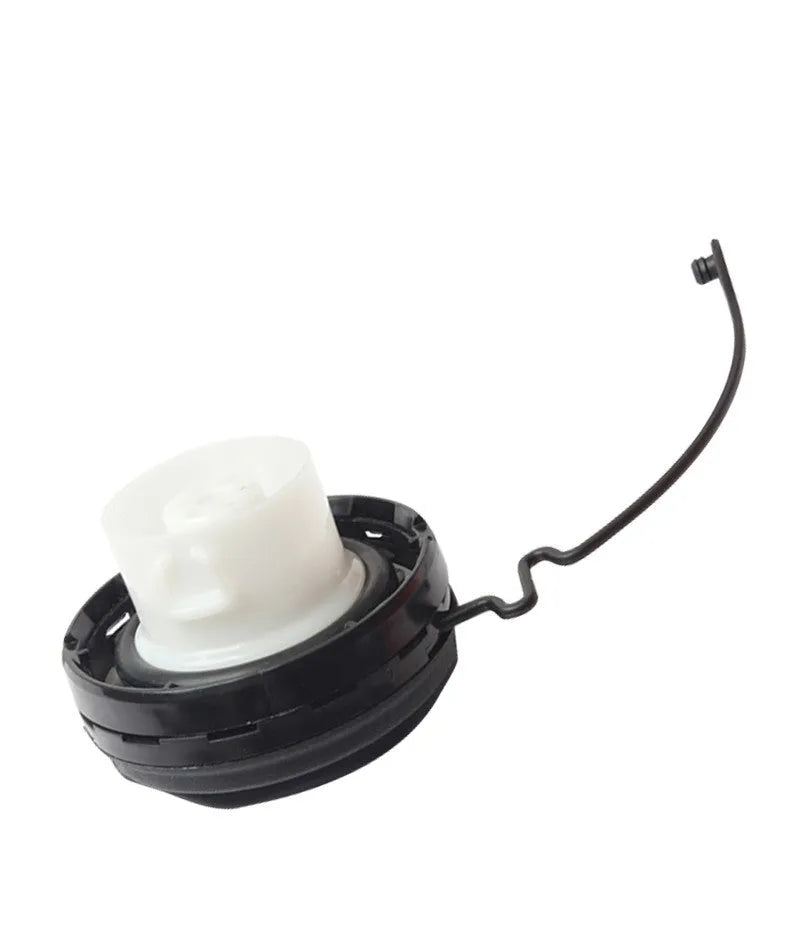 Black plastic Toyota fuel tank cap with snap-type fitting mechanism
