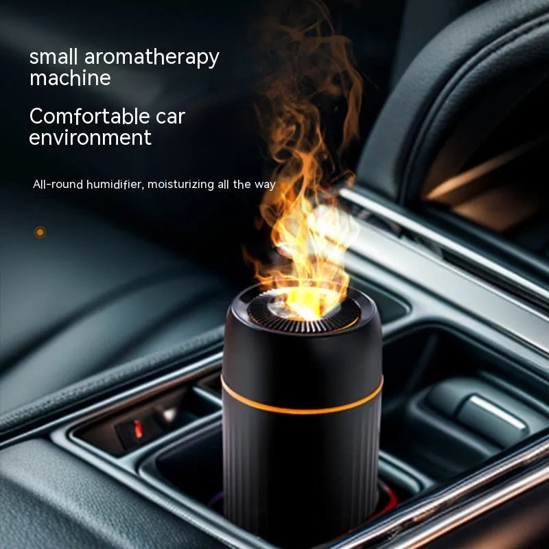 Black car aroma diffuser with flame simulation effect showing automatic sprayer functionality