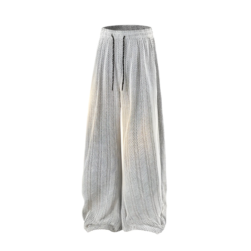Straight-leg hollow-out trousers with elastic waist in light grey, dark grey, or black.