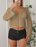 Women's hollow woven cardigan blouse with bell sleeves in apricot colour showing texture detail